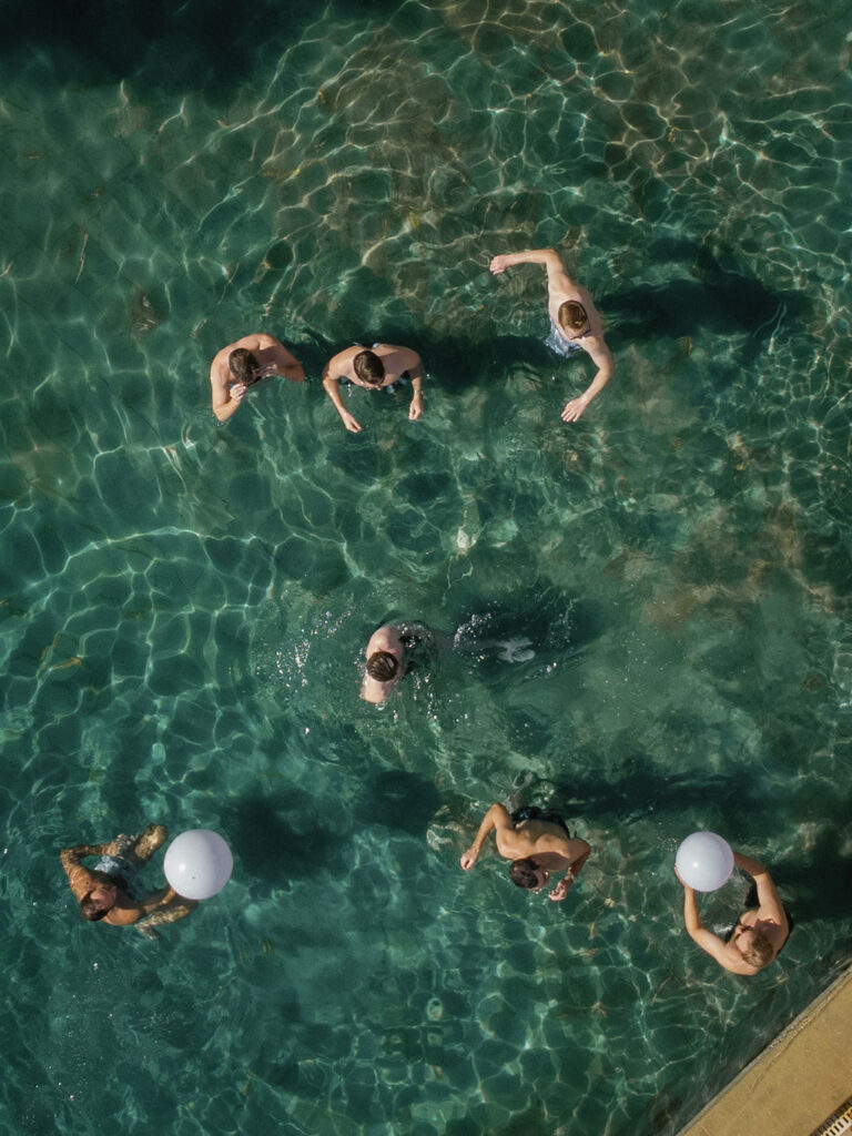 Guests enjoying a pool during a relaxed Provence wedding weekend experience.
