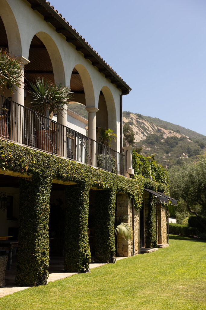 Santa Barbara–area wedding venue with arched architecture, stone details, and manicured lawn, ideal for a California destination wedding.